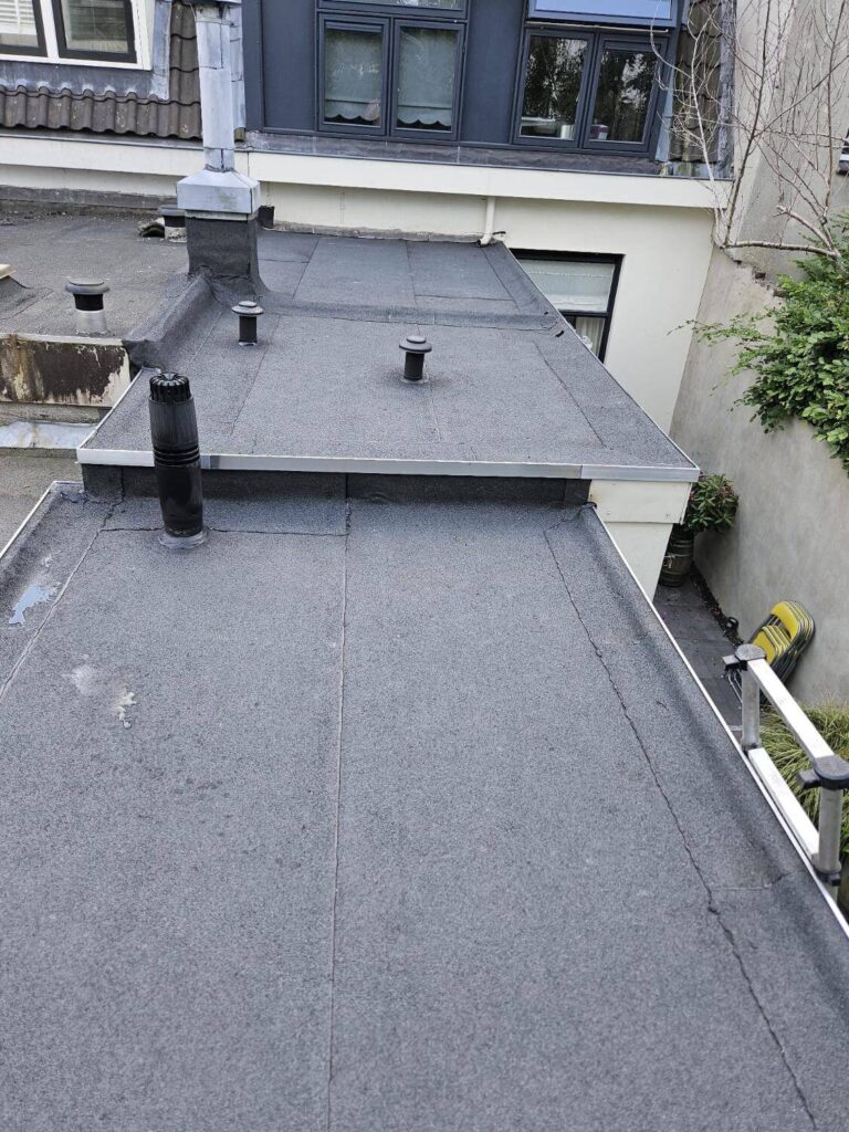 nood overstort plat dak